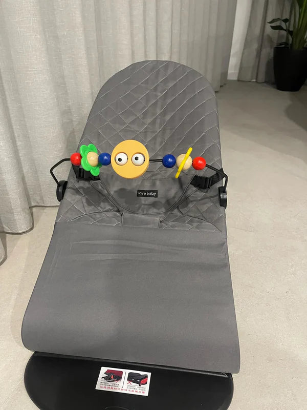 Baby bouncer with detachable toy bar
