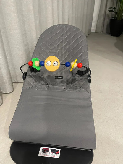 Baby bouncer with detachable toy bar